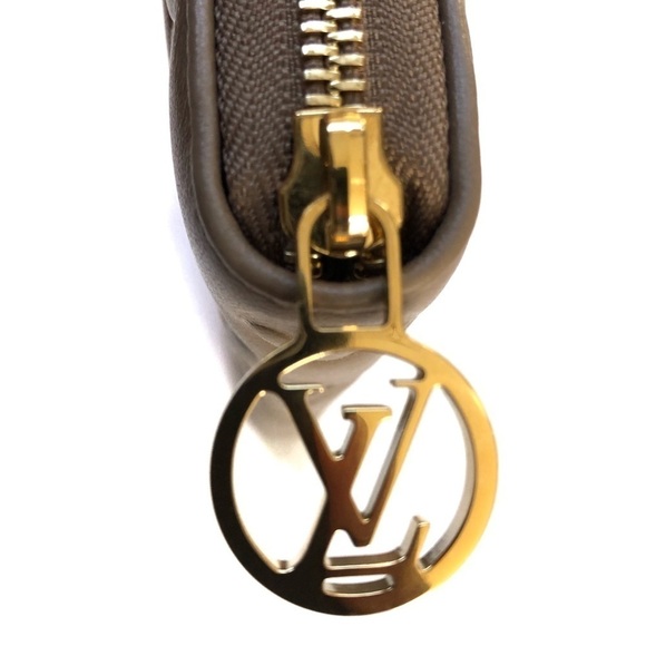 Authentic Louis Vuitton Coussin Monogram  Embossed Lambskin Leather Zippy Wallet - Picture 13 of 16
